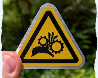 entanglement hazard brushed silver sticker