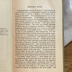 May include: Open book with text titled "EDITOR'S NOTE" and dates along the left side. The text is in black ink on aged, off-white paper. The text discusses the publication of Emerson's first book and Carlyle's thoughts on it.