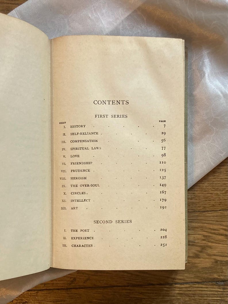 May include: Open book with a contents page visible. The page is aged with a tan color and features a list of essays with page numbers. The title "CONTENTS" is at the top, with "FIRST SERIES" and "SECOND SERIES" headings.