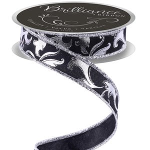 May include: A spool of black ribbon with a silver floral design and silver trim. The ribbon is labeled "Brilliance Ribbon" on the spool. The ribbon is unrolled and spiraling downward.