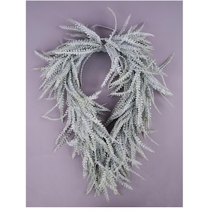 May include: A teardrop-shaped artificial wreath composed of numerous fern-like branches with a frosted, silvery-white finish. The foliage is densely arranged, creating a cascading effect with fine, needle-like leaves that taper toward the bottom.