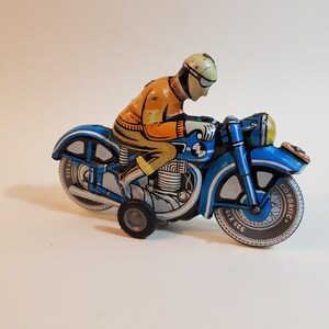 160x100mm,Moto,friction,jouet,mécanique,tole,fer blanc,lithographié,Made in,West Germany,état fonctionnel