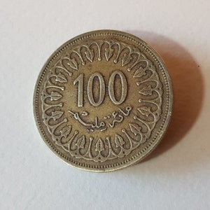 100 Millimes Dinar Tunisie en laiton 1996-1416 écriture Arabe et chiffres diamétre 2,5Cm poids 7Gr éxcellent état TTB+