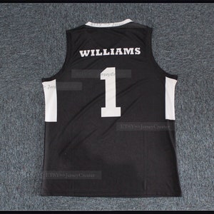 Puede incluir: Jersey negro sin mangas con detalles blancos. El jersey tiene el nombre "WILLIAMS" y el número "1" impreso en la espalda.