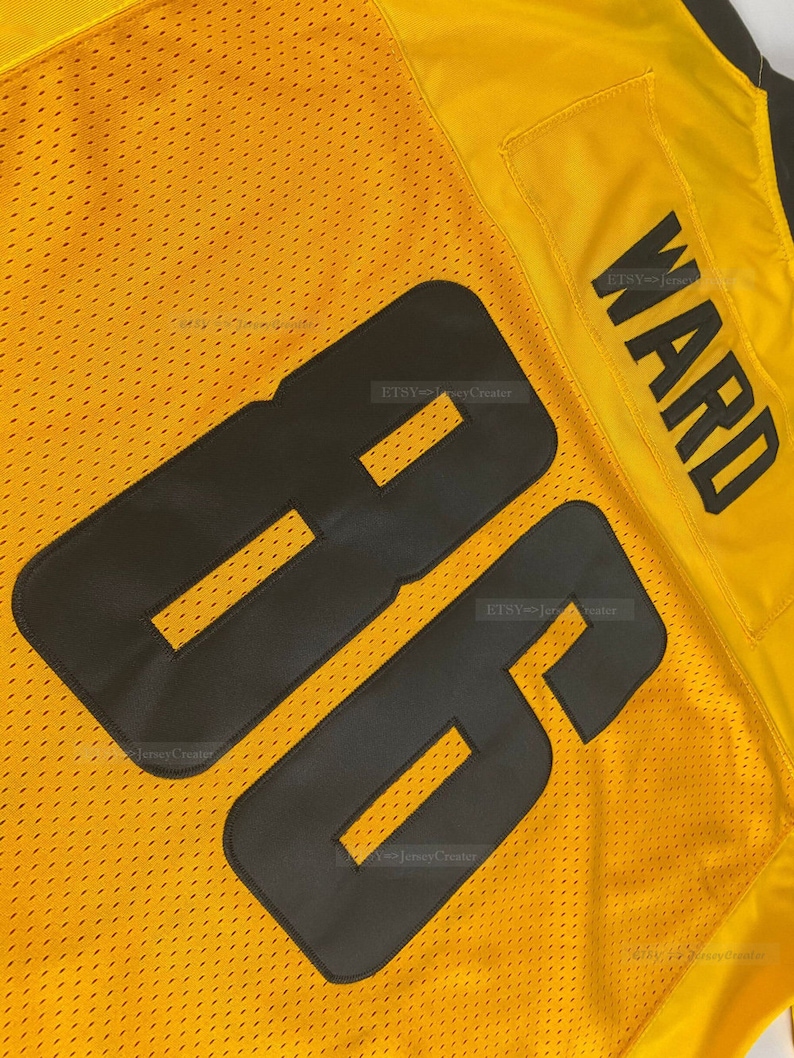 May include: A yellow football jersey with black mesh fabric and the number 86 on the back. The name "WARD" is printed on the back of the jersey in black.