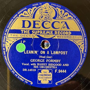 George Formby 78 rpm Apoyado en una farola / Cuando limpio ventanas 1950 Goma laca