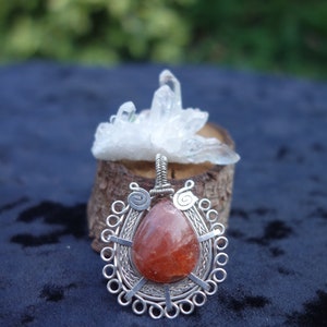 Silver chain pendant with sunstone
