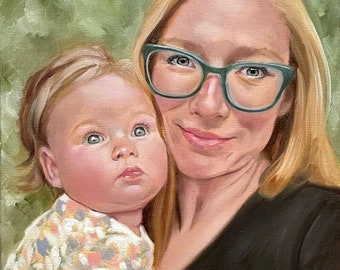 May include: A painting of a woman with blonde hair wearing green glasses holding a young child with blonde hair. The woman is wearing a black shirt and the child is wearing a floral dress.