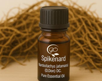 May include: A small brown glass bottle of Spikenard essential oil with a black cap. The label includes the brand logo and the words "Spikenard", "Nardostachys jatamansi (D.Don) DC.", and "Pure Essential Oil". The background features a blurred, textured, brown element.