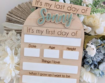 May include: Wooden milestone board with the name "Sonny" in a light blue script. The board includes sections for date, age, height, and "Things I love." It also has the text "It's my last day of" and "It's my first day of."