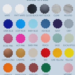 May include: A colour chart labelled "Solid Range" with various colours, including white, black, blue, pink, and yellow. Each colour is displayed in a scalloped circle with its name underneath. The chart includes the text "Evermore Gifts & Favours".