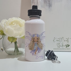 May include: White aluminum water bottle with a personalized design featuring a fairy with purple wings and a flower crown. The bottle has a black lid and a black carrying strap. The text "Emily" is printed on the bottle. The text "Kent Craft Studio Personalisation & Print" is printed on the background.