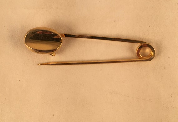 Gold safety pin