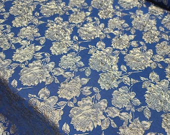 Tessuto broccato blu reale: rivestimento con stampa floreale argentata - 58 pollici