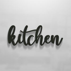 May include: Black wooden sign with the word "kitchen" written in a cursive font.