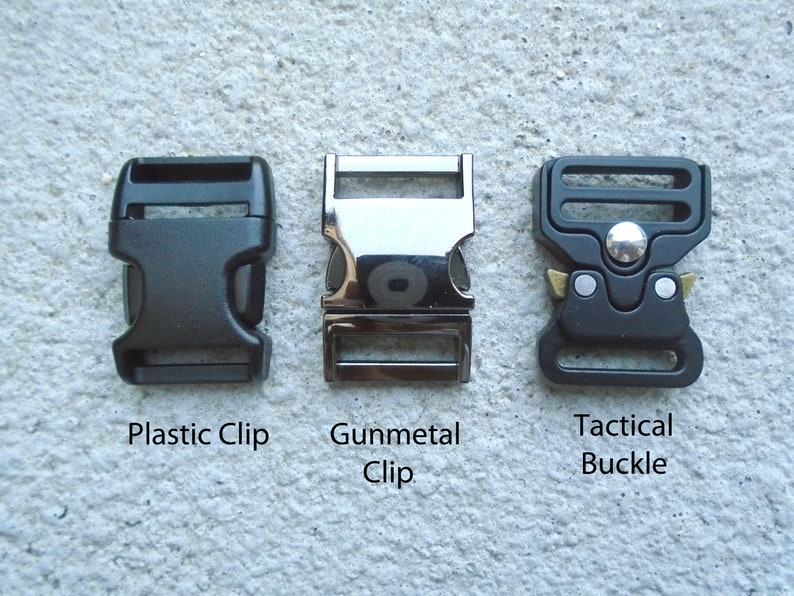 May include: Three different types of clips for attaching straps or webbing. The first is a black plastic clip, the second is a gunmetal clip, and the third is a black tactical buckle with a silver button.