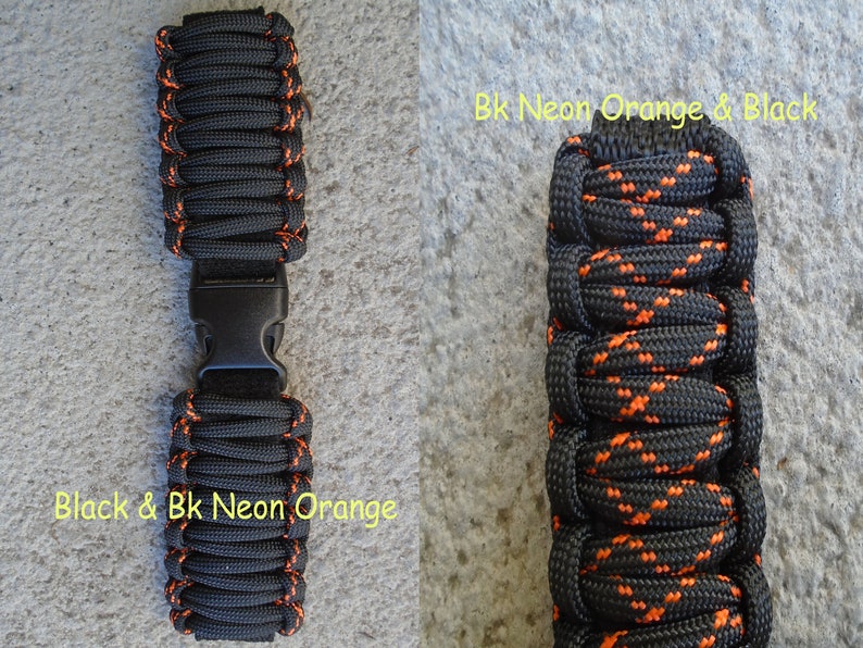 May include: Two black paracord bracelets with orange accents. The bracelet on the left has the text "Black & Bk Neon Orange" and the bracelet on the right has the text "Bk Neon Orange & Black".