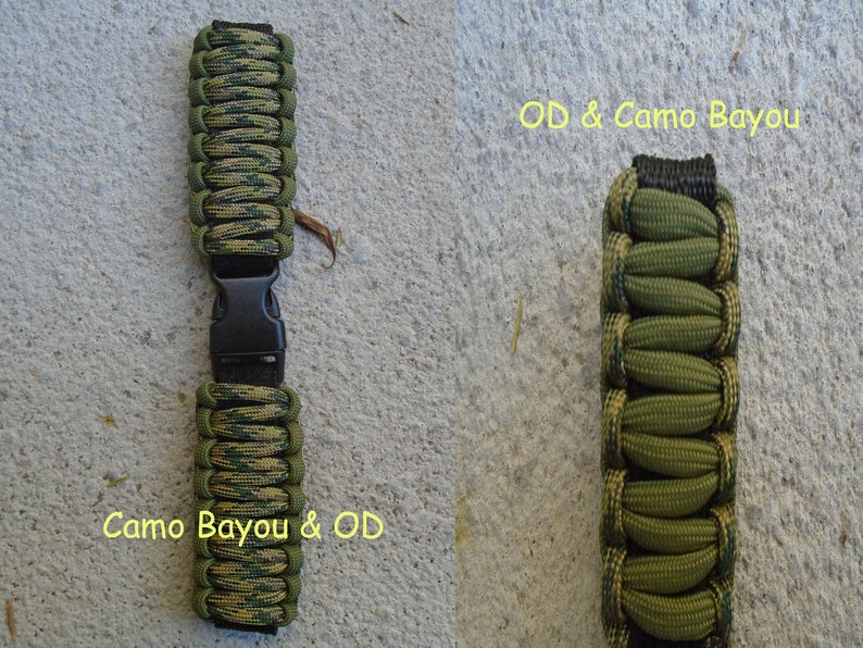 May include: Two paracord bracelets in green and black camouflage patterns. The bracelet on the left is labeled "Camo Bayou & OD". The bracelet on the right is labeled "OD & Camo Bayou".