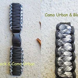 May include: Two paracord watch bands, one black with white accents and one black and white camouflage pattern. The bands are shown side-by-side with the text "Camo Urban & Black" and "Black & Camo Urban" printed below each band.