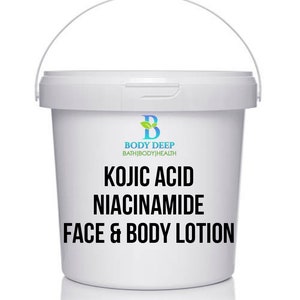 May include: White plastic bucket with a handle, containing a white lotion. The label reads "Body Deep Bath|Body|Health Kojic Acid Niacinamide Face & Body Lotion"
