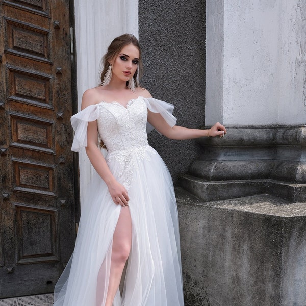 Ivory tulle A line boho wedding dress. Modern corset bridal ball gown. Custom unique beach wedding dress.