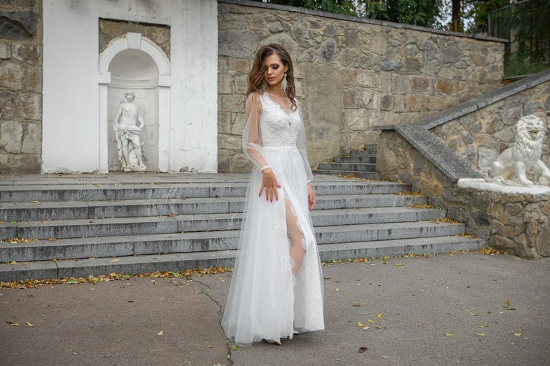 Ivory lace and tulle wedding dress with deep V neck and long sleeves. Unique fairy transformer 2 in 1 custom A line bridal dress. image 4