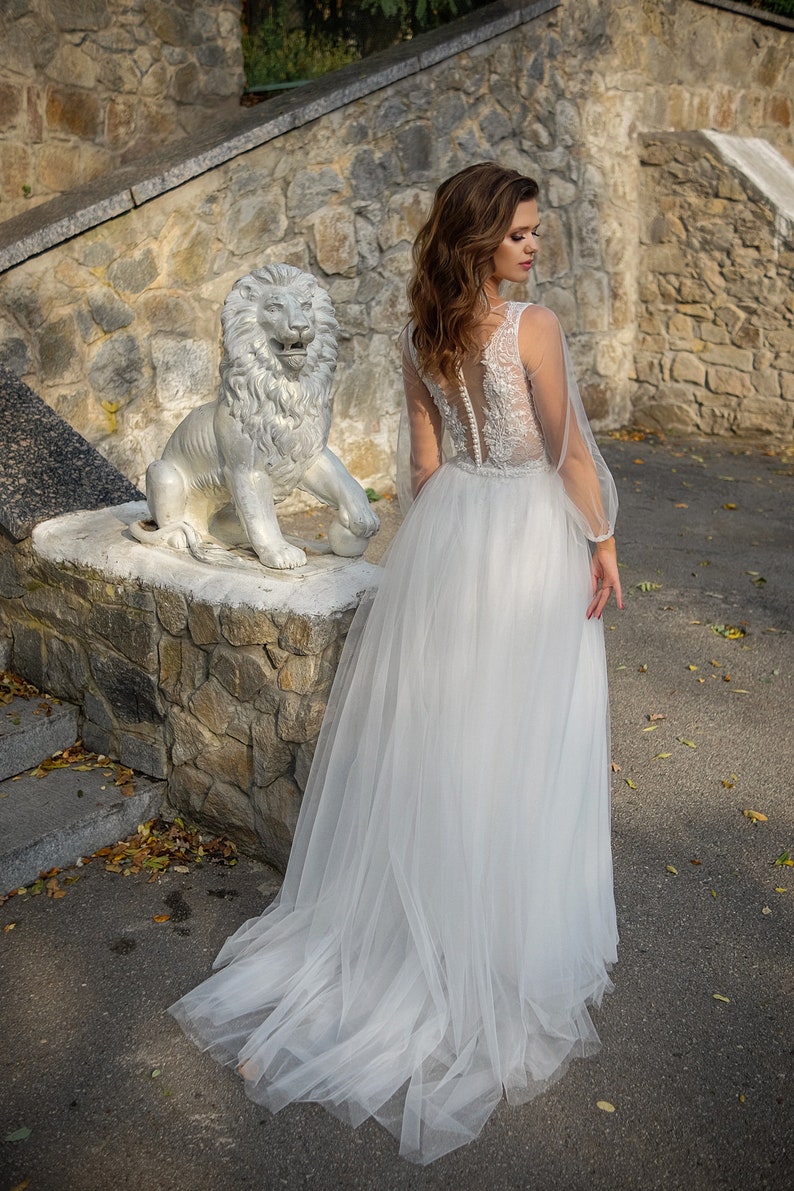 Ivory lace and tulle wedding dress with deep V neck and long sleeves. Unique fairy transformer 2 in 1 custom A line bridal dress. image 5