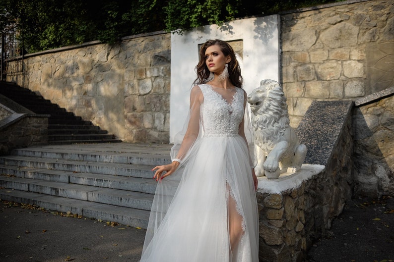 Ivory lace and tulle wedding dress with deep V neck and long sleeves. Unique fairy transformer 2 in 1 custom A line bridal dress. image 3
