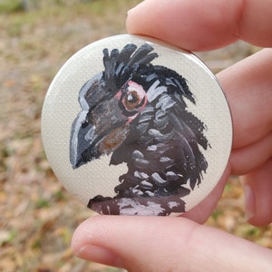 Trumpeter Hornbill button