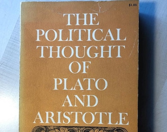 May include: A vintage book titled "The Political Thought of Plato and Aristotle" with a gold cover and white lettering. The cover features an illustration of a classical architectural element and a black sticker with the text "SIR ERNEST BARKER".