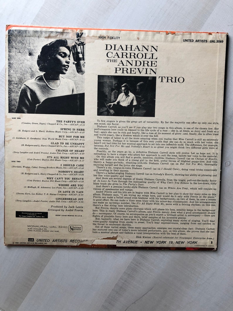May include: A vintage vinyl record cover featuring a black and white photo of Diahann Carroll, a singer, with a microphone. The cover also features the text "Diahann Carroll The Andre Previn Trio" and "United Artists UAL 3069".