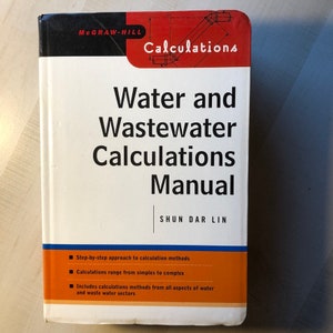 May include: A white book with a red and black cover titled "Water and Wastewater Calculations Manual" by Shun Dar Lin. The book is a guide to water and wastewater calculations, with a step-by-step approach to calculation methods.
