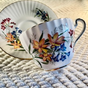 In Excellent Vintage Condition, Made in England —One Cup and One Matching Saucer—Fine Bone China—Floral Pattern—by &quot;Roslyln&quot;
