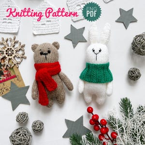 May include: A knitted bear with a red scarf and a knitted bunny with a green scarf are shown. The words "Knitting Pattern" are at the top left. The image includes decorative stars, ornaments, and the text "ENG PDF".