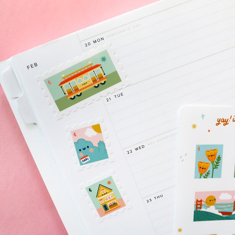 May include: A set of colorful stickers featuring illustrations of a cable car, a cloud with a face, a house, a flower, and a bridge. The stickers are designed to look like postage stamps with a scalloped edge.
