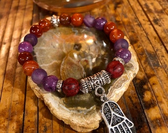 Braccialetto con ciondolo a forma di mano di Hamsa: perline arancioni e viola, gioielli boho