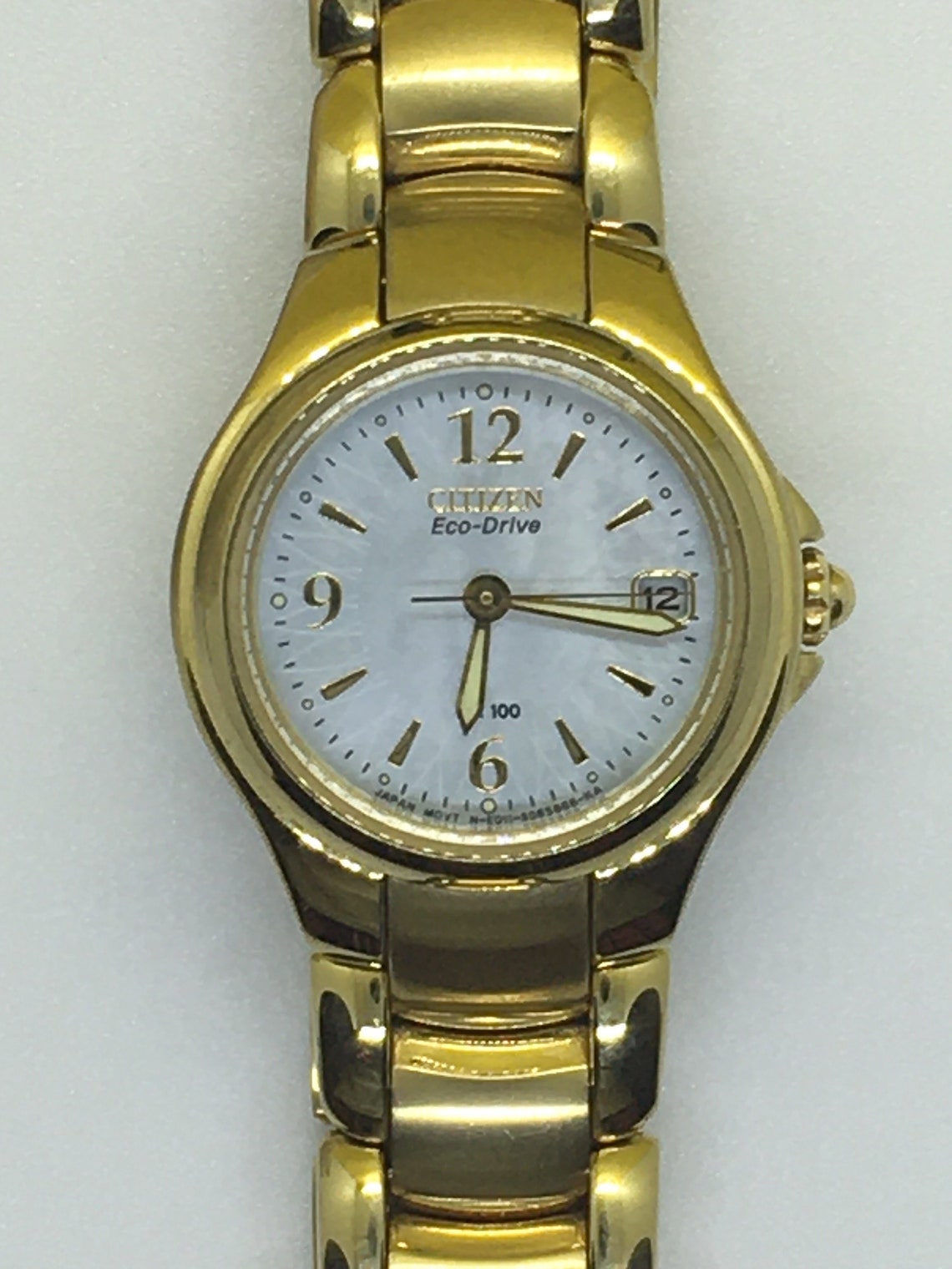 citizen eco drive wr 100 gold