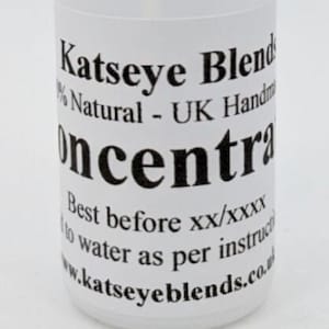 May include: A clear plastic bottle with a white cap. The bottle is labelled "Katseye Blend 100% Natural - UK Handmade Concentrated". The label also includes instructions for use and a best before date.
