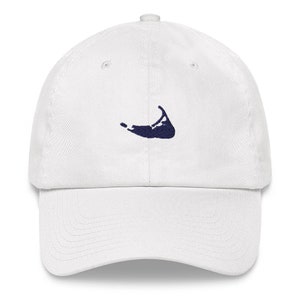 May include: White baseball cap with a navy blue embroidered outline of an island.