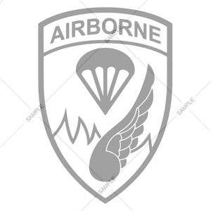 May include: A grey shield-shaped emblem with the word "AIRBORNE" at the top. The emblem features a parachute, a wing, and a mountain range design. The design is in a simple, graphic style.