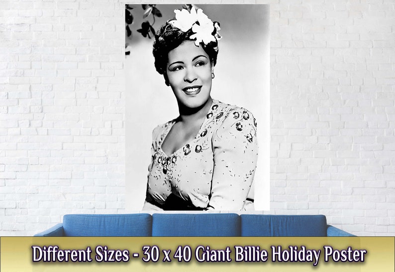 May include: Black and white poster featuring a portrait of Billie Holiday. She is wearing a white blouse with sequins and a white flower in her hair. The poster is 30 inches by 40 inches.