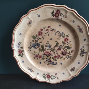 Vintage French round serving plate faience de Rouen, representing a horn of plenty