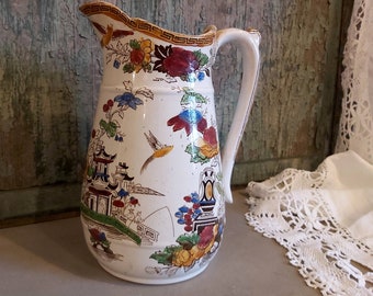 Beautiful vintage jug for water with oriental motifs