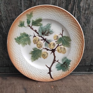 French vintage plate decorated with prunes, in barbotine Saint Amand