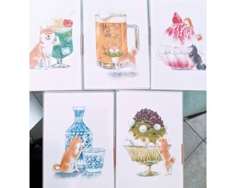 May include: Four illustrated cards featuring a Shiba Inu dog with various beverages and desserts. The cards feature a green soda with a cherry, a glass of beer, a strawberry shaved ice, and a green tea shaved ice.
