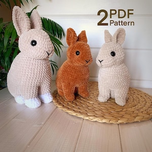 May include: Two crochet bunny patterns in PDF format. The bunnies are beige and brown, sitting on a woven mat.