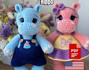 May include: Crochet pattern for a hippopotamus amigurumi toy. The pattern includes two hippos, one blue and one pink, wearing different outfits. The pattern is available as a PDF download. The image also includes the text "Crochet pattern Hippo" and a US flag.
