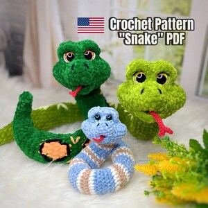 May include: Three crocheted snake toys in shades of green and blue. The largest snake is green with yellow accents, while the smaller one is blue and white striped. The text "Crochet Pattern 'Snake' PDF" is visible.
