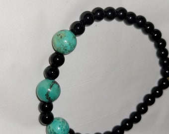 Bracelet 6 5" en agate noire avec 3 pierres de magnésite