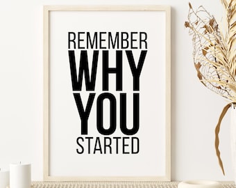 May include: A framed print with the text "Remember why you started" in black bold letters on a white background.
